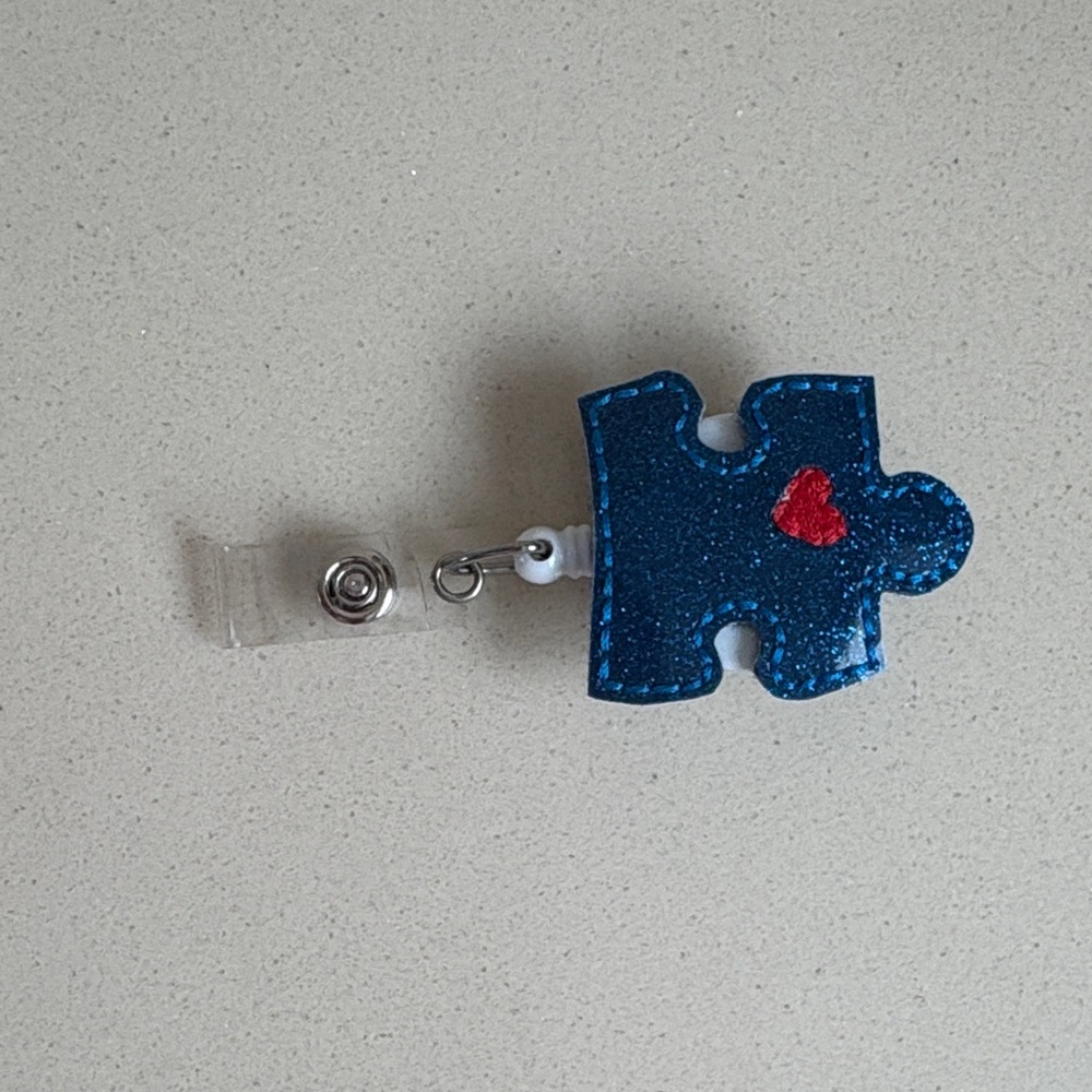 Blue Puzzle Badge Reel Autism Awareness
